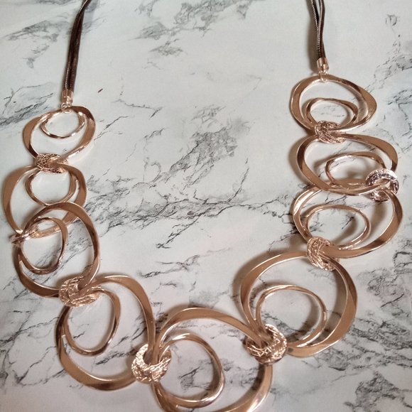 Charming Charlie Jewelry - Vtg Charming Charlie 36" Rose Gold Spiraling Circles Statement Fashion Necklace